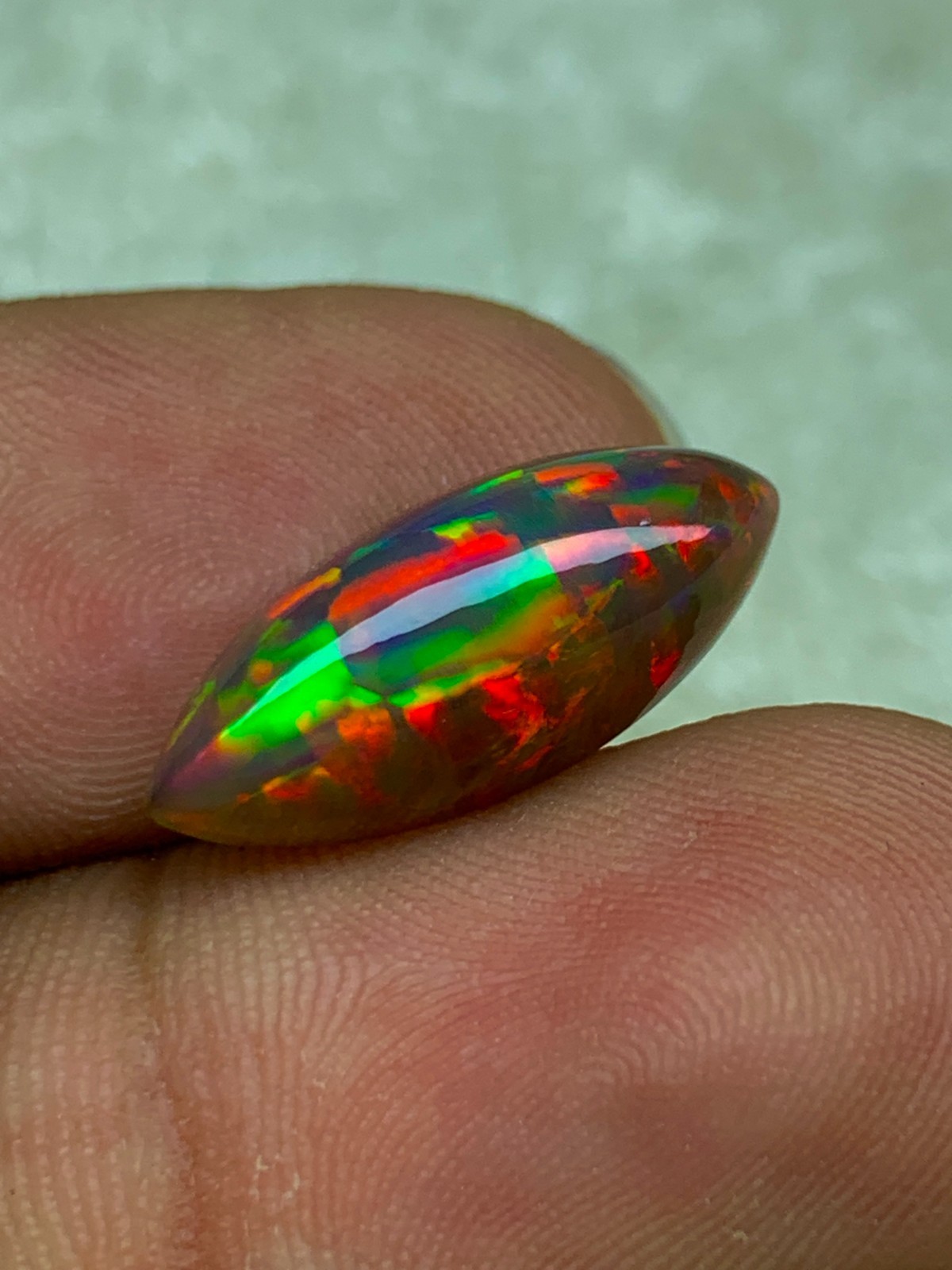 Shewa Chocolate Ethiopian Opal Gemstone 4.55 Carat Multi-Fire Marquise Cabochon