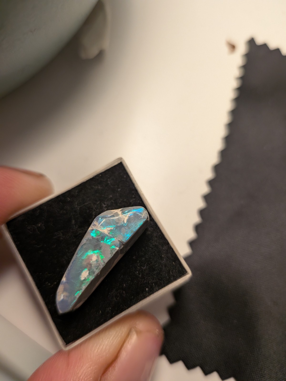 opal blue and green on black