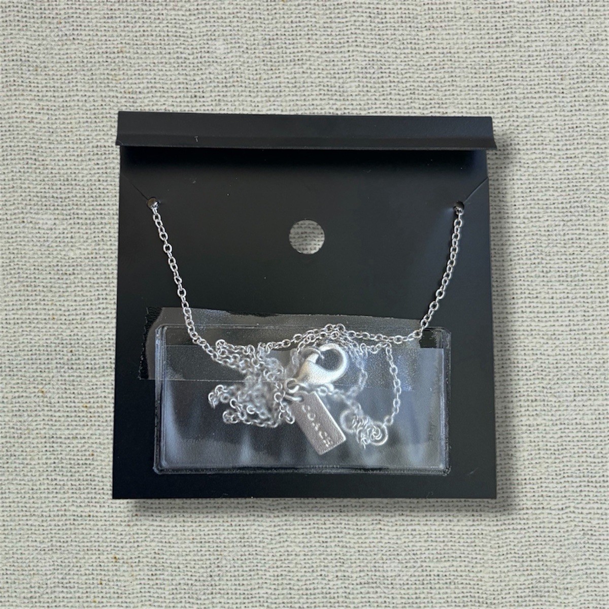 Authentic Coach Silver Interlocking Ring Necklace 16″+2″ Chain New w/ Card