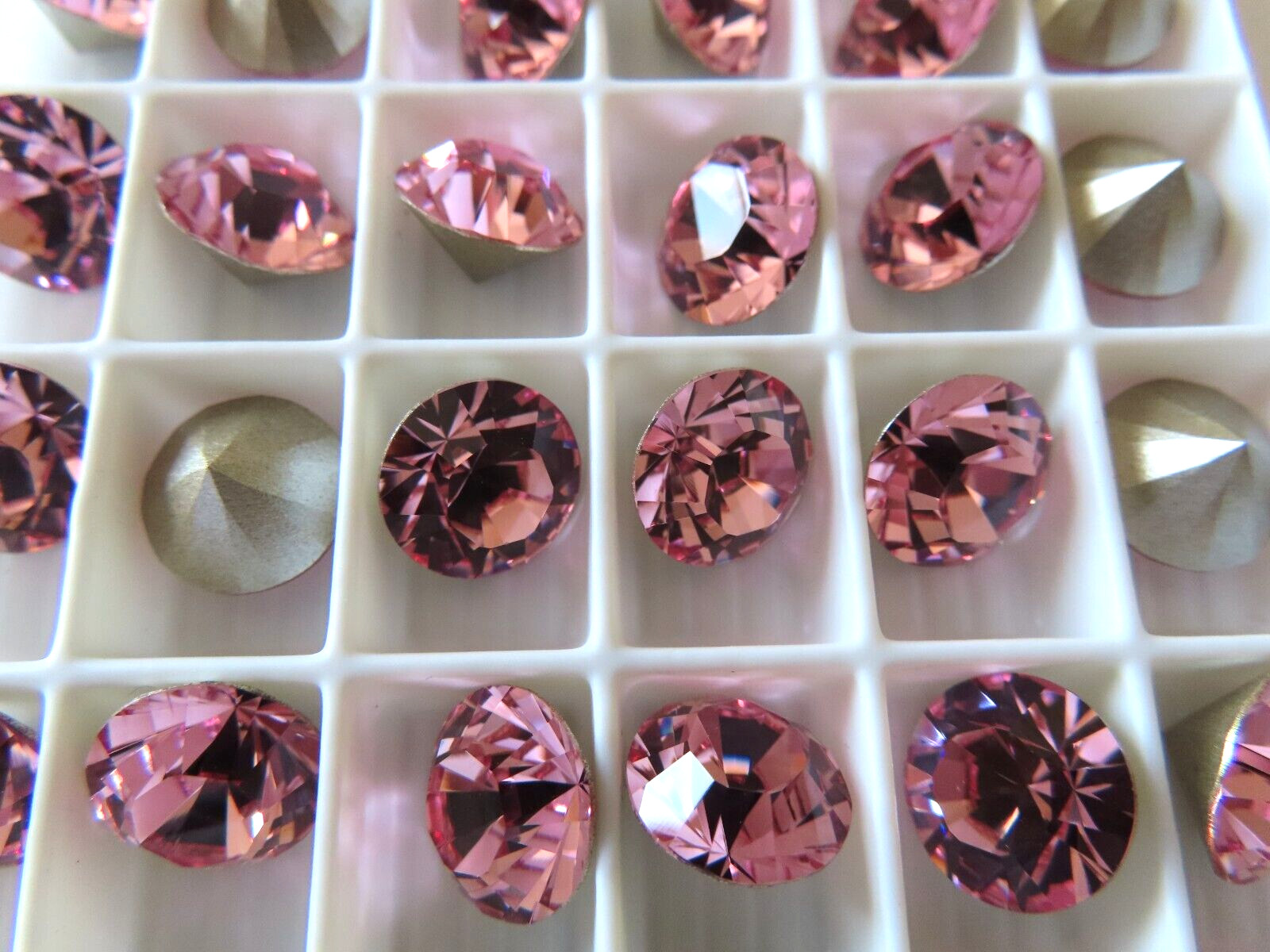 24 Swarovski XILION Rhinestones 47ss Light Rose/foiled. #1028