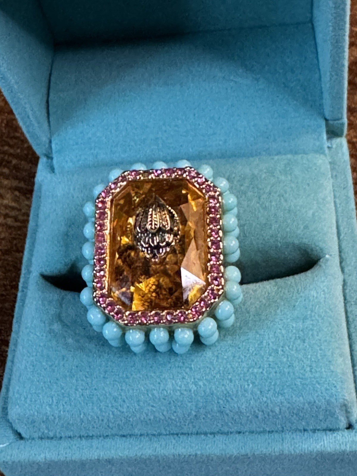 KURT GEIGER LONDON GOLD TONE EMERALD CUT COCKTAIL EAGLE HEAD RING IN ORANGE 7
