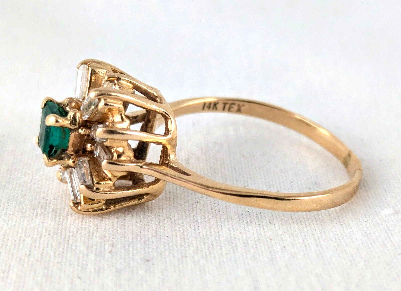 14K Gold Approx .35 Ct Emerald and .50 Ct Baguette Diamond Halo Ring Size 8.5