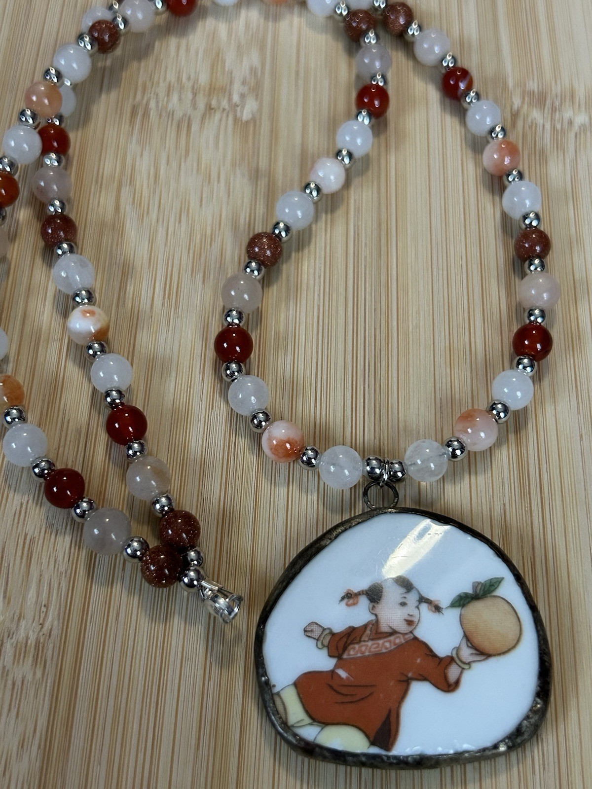 Handmade natural stone beaded necklace with vintage hand painted China pendant.