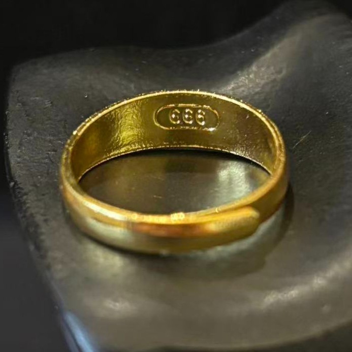 Gold-plated? (NOT SURE) Smooth Band Ring, marked ‘ 999 ‘, Size 8.5 adjustable