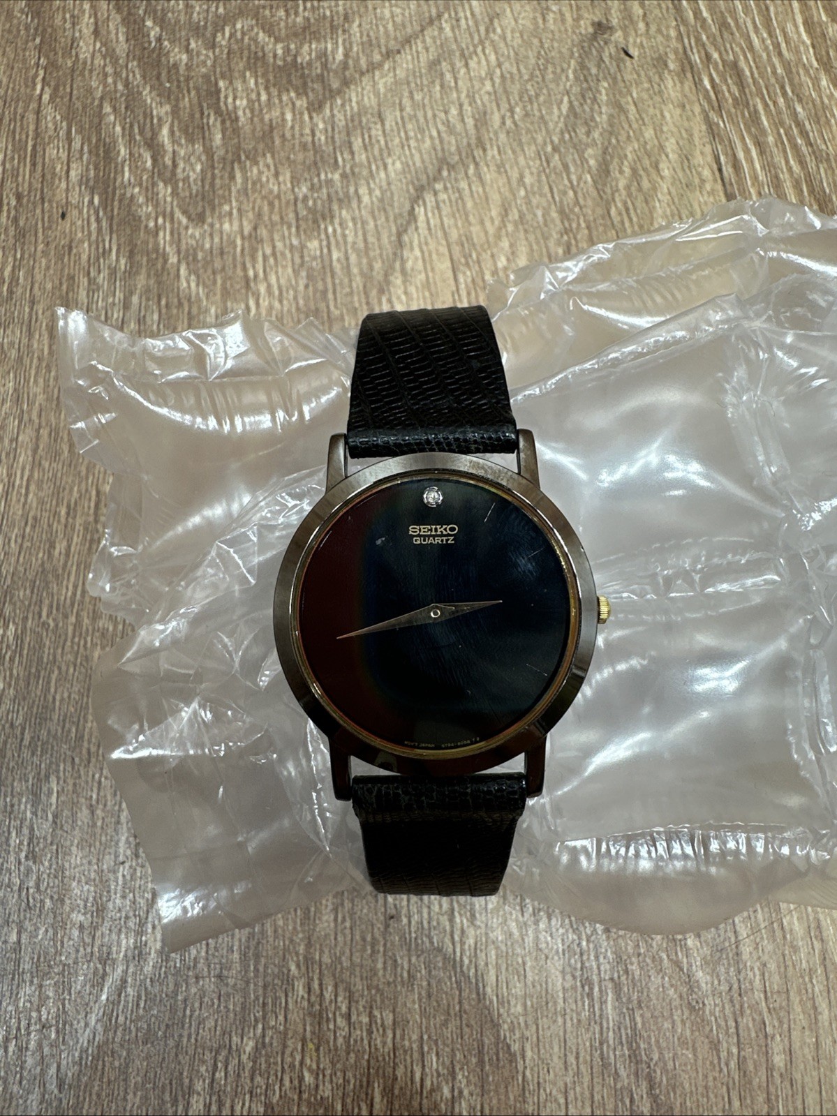 VINTAGE Rare Men’s Seiko Museum Quartz Black/Gold Watch w/ Diamond READ