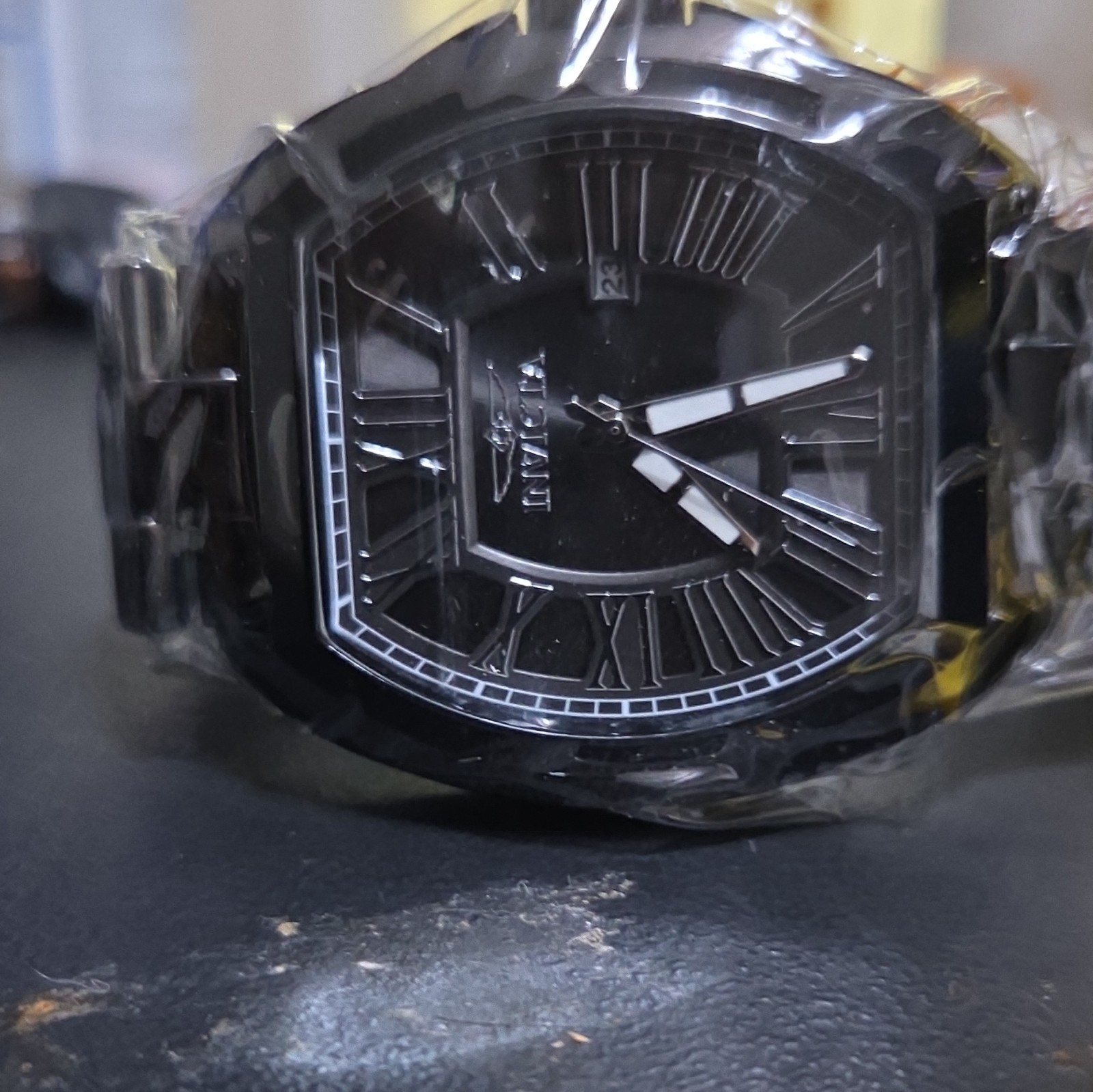 Invicta Men’s Quartz Black Dial Roman Numerals Date Tonneau Watch w/ Box