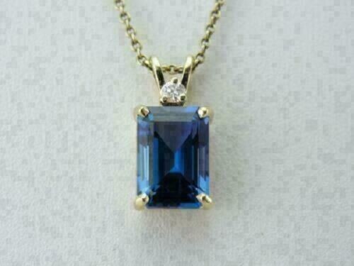 2Ct Emerald Cut Blue Sapphire Women’s Solitaire Pendant 14K Yellow Gold Finish