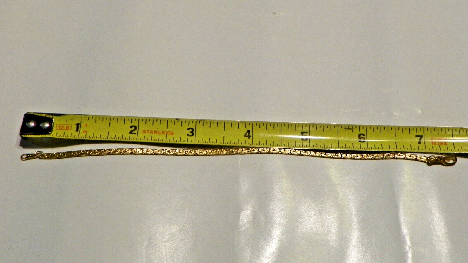 14KGP 7.5 Bracelet. Stamped 14KGP with a unusual link