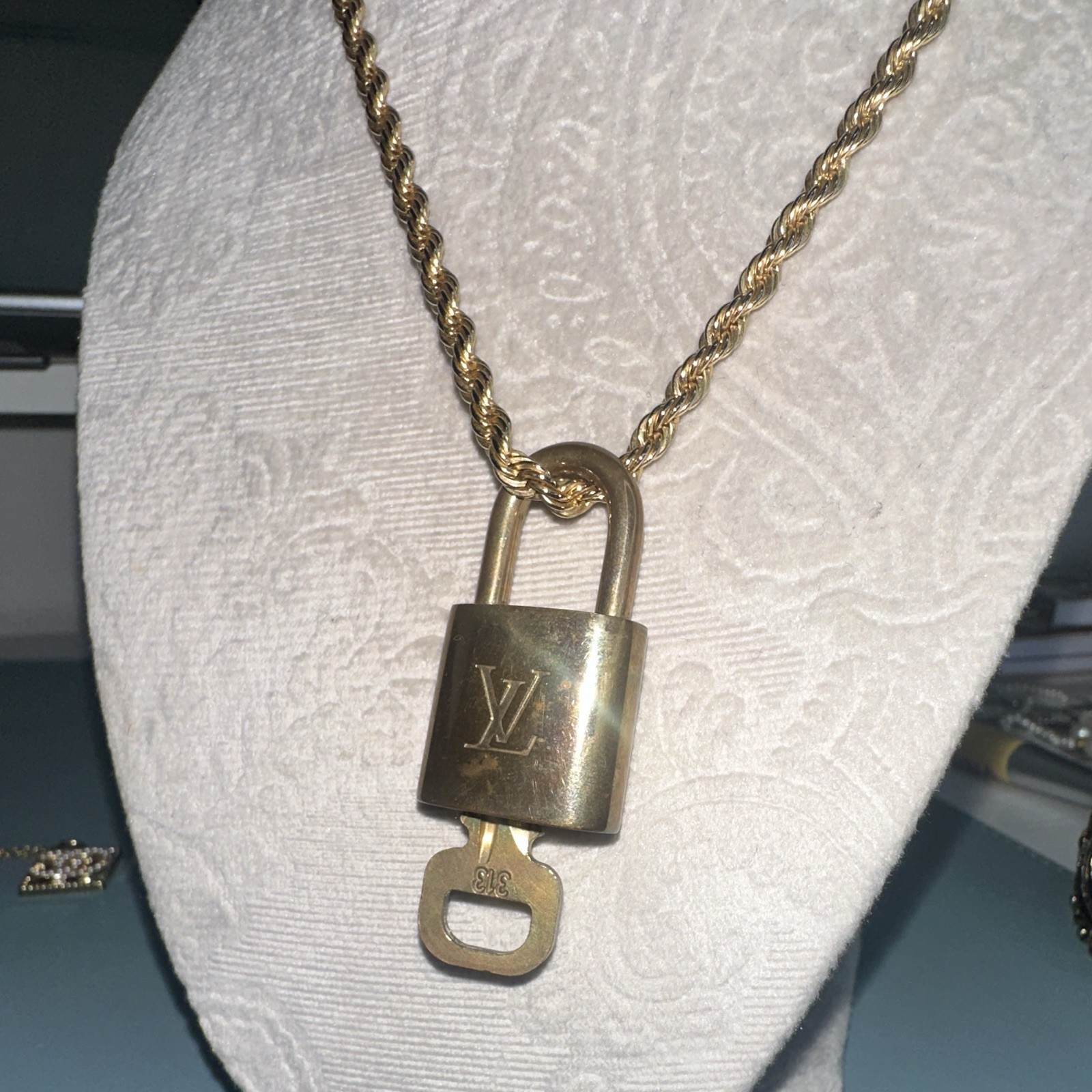 Louis Vuitton Signed Gold Tone Padlock Charm and key. #313