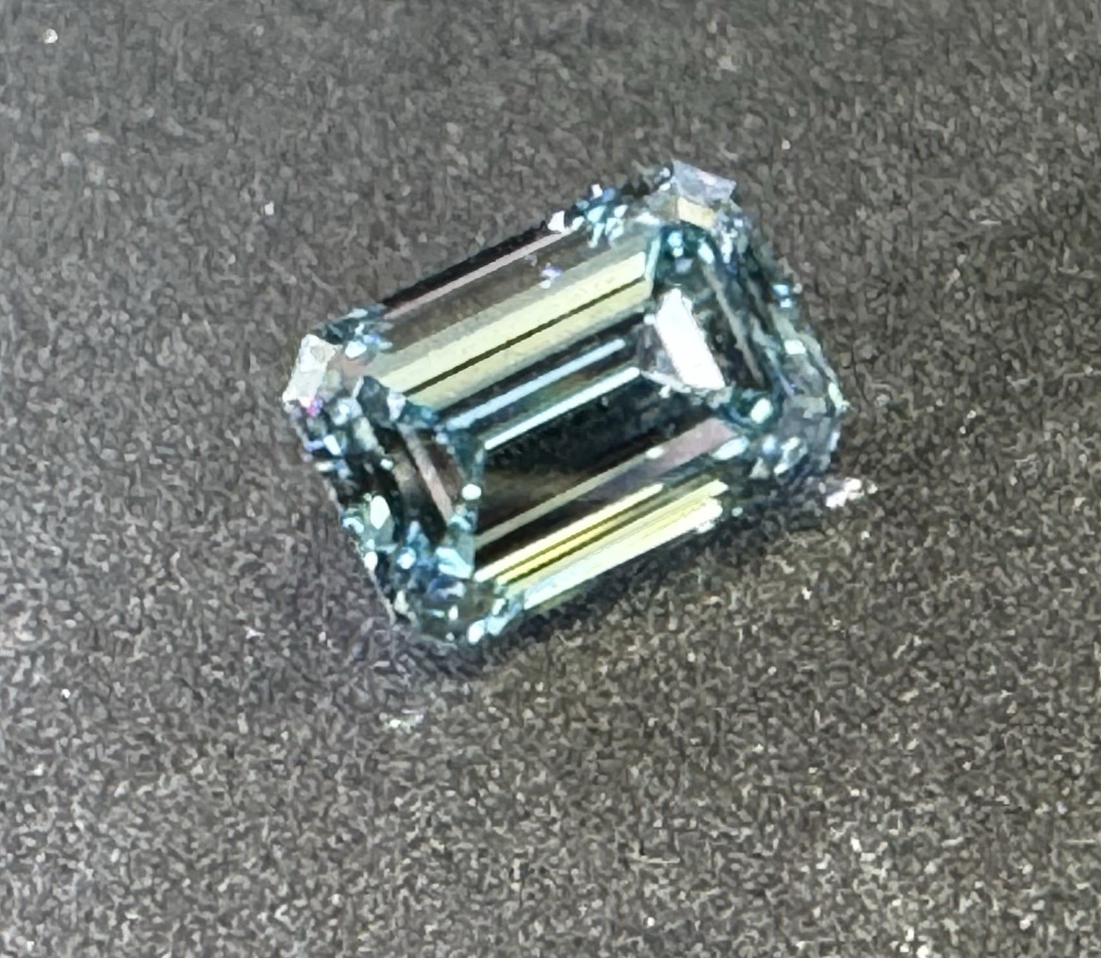 Lab Grown Emerald Cut 2.41 Fancy Vivid Blue SI IGI Certified Diamond