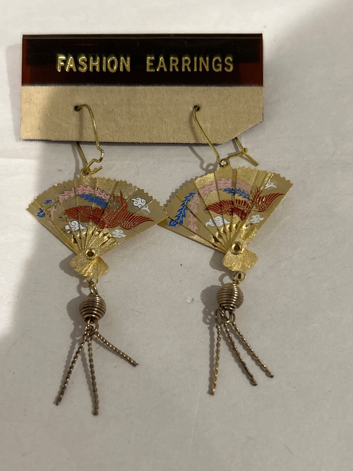 Asian Styled Adjustable Fan Earrings and Necklace. The chain is 10k
