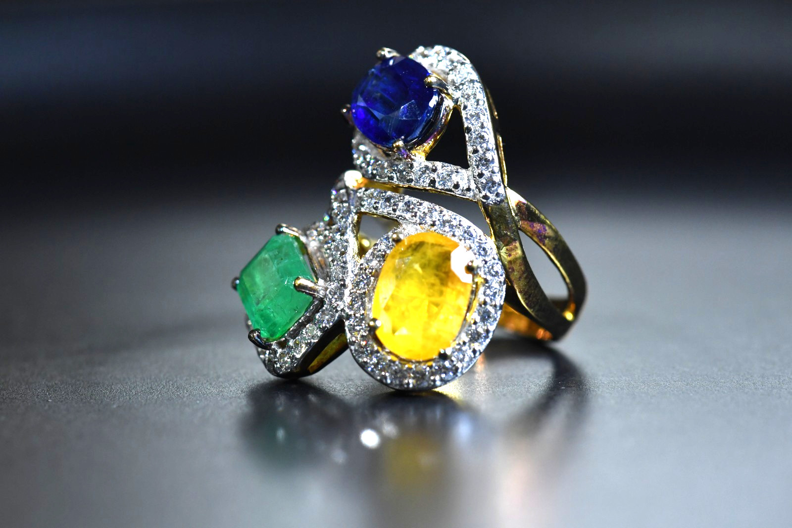 3 Stone Multi Gemstone Ring Emerald, Kyanite, Yellow, Sapphire surrounded CZ