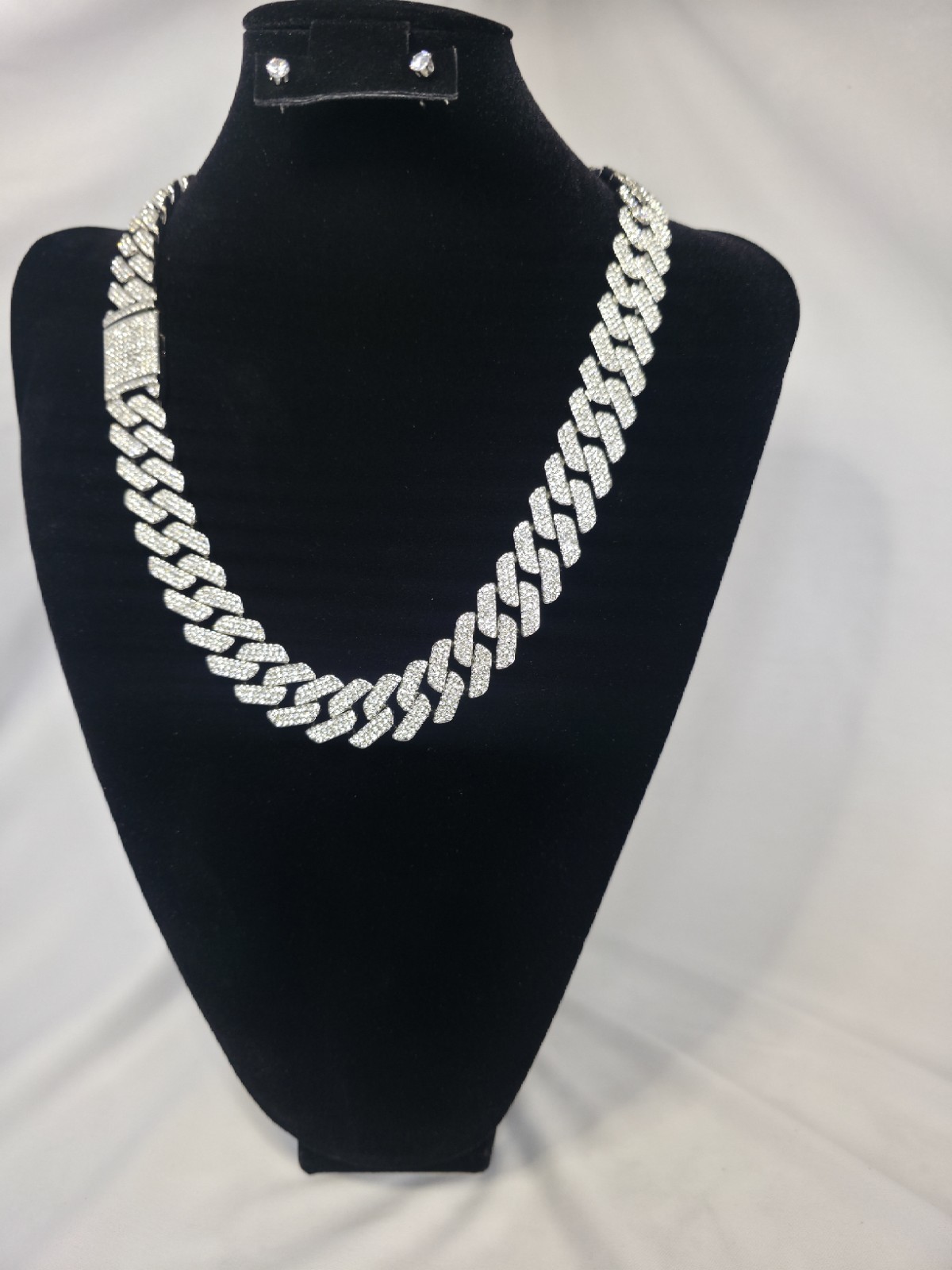 24” 3 Row Moissanite Cuban Link Chain in 925 Sterling Silver.