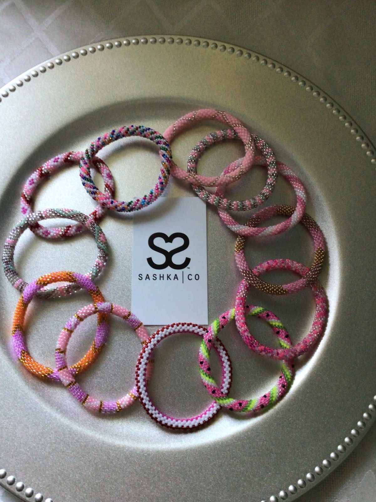 PINK COLORED 7″ ROLL ON SASHKA BRACELETS, 12 PCS