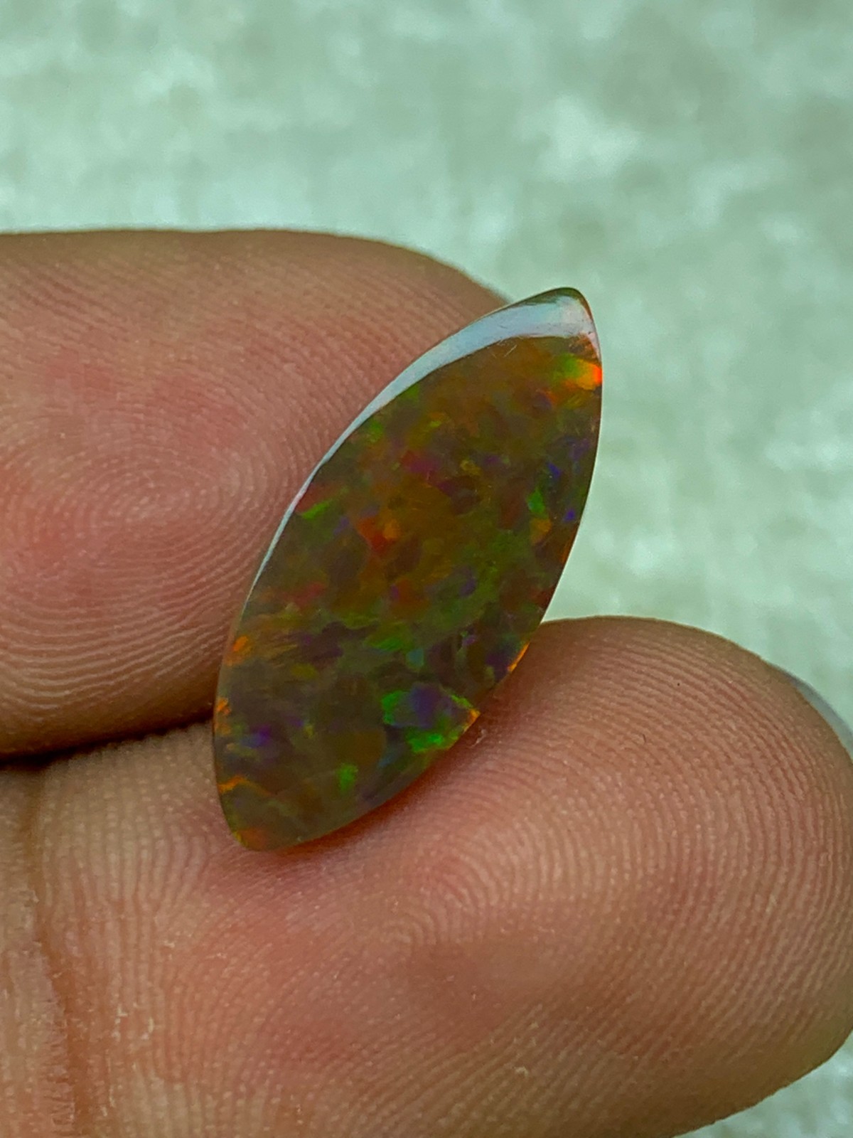 Shewa Chocolate Ethiopian Opal Gemstone 4.55 Carat Multi-Fire Marquise Cabochon