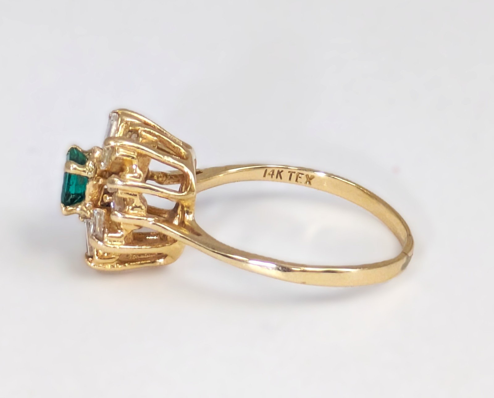 14K Gold Approx .35 Ct Emerald and .50 Ct Baguette Diamond Halo Ring Size 8.5