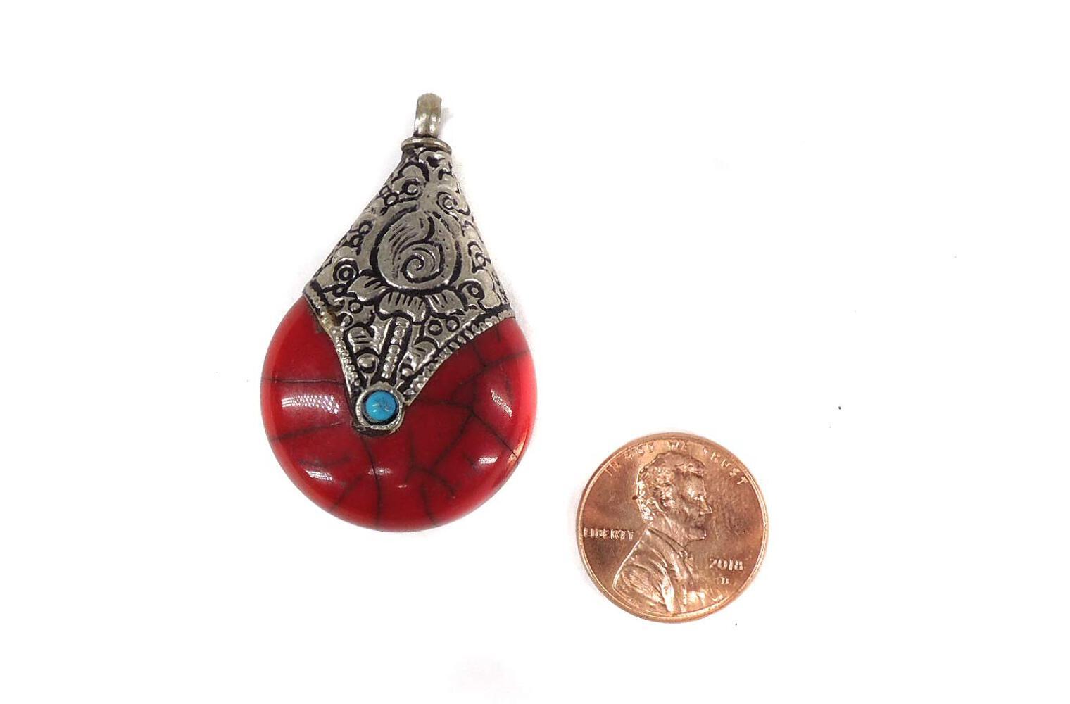 Tibetan Red Crackle Silver Repoussé Pendant