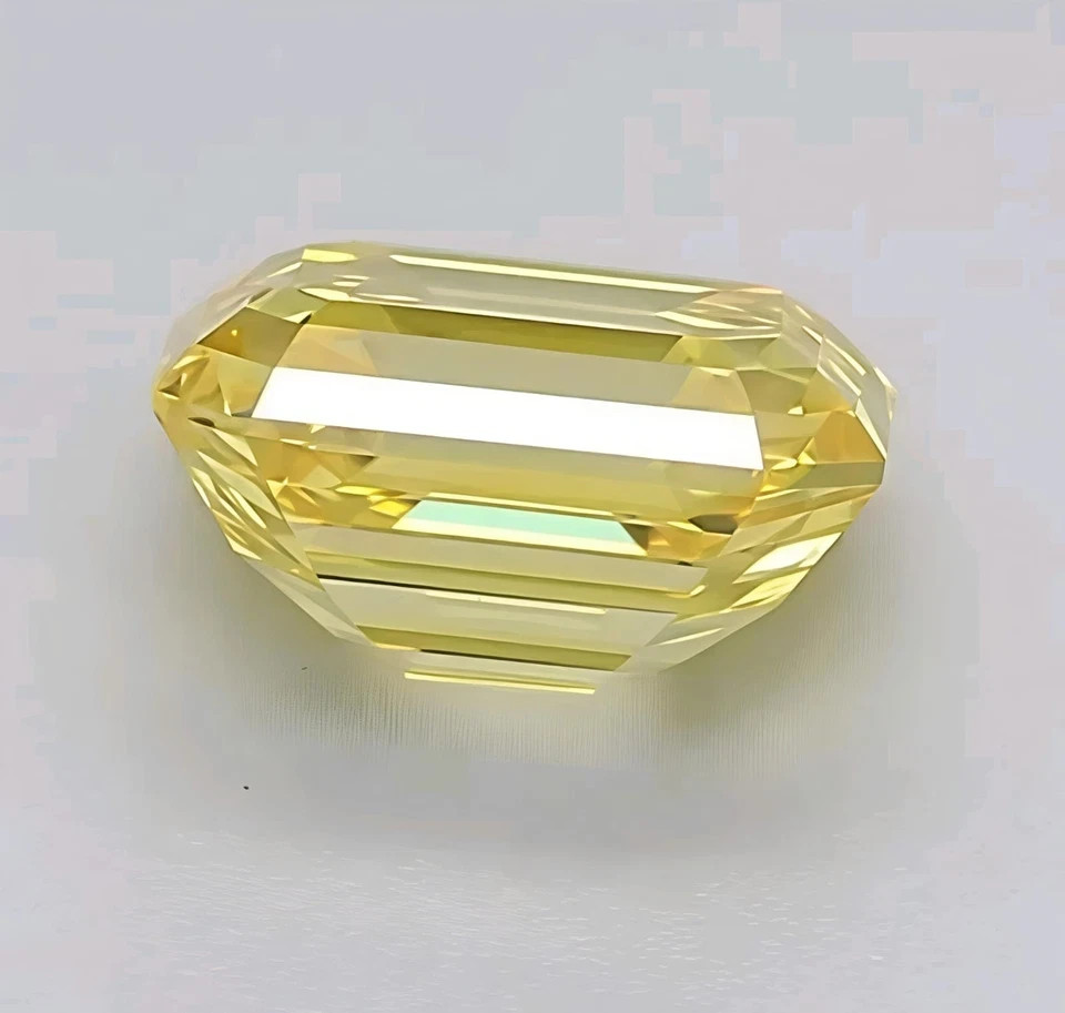 2.4 Ct fancy yellow color Emerald Cut VVS1 Diamond Premium Quality Gemstone 7×9