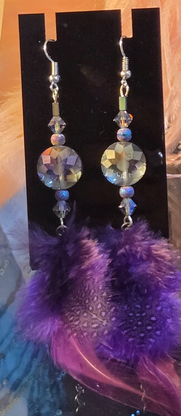 Elegant and Classy Purple feathered earrings